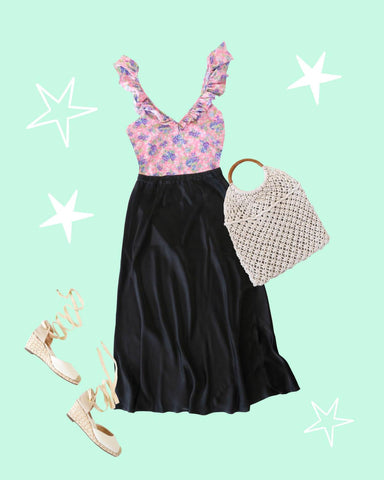 swimming costume and skirt outfit flat lay